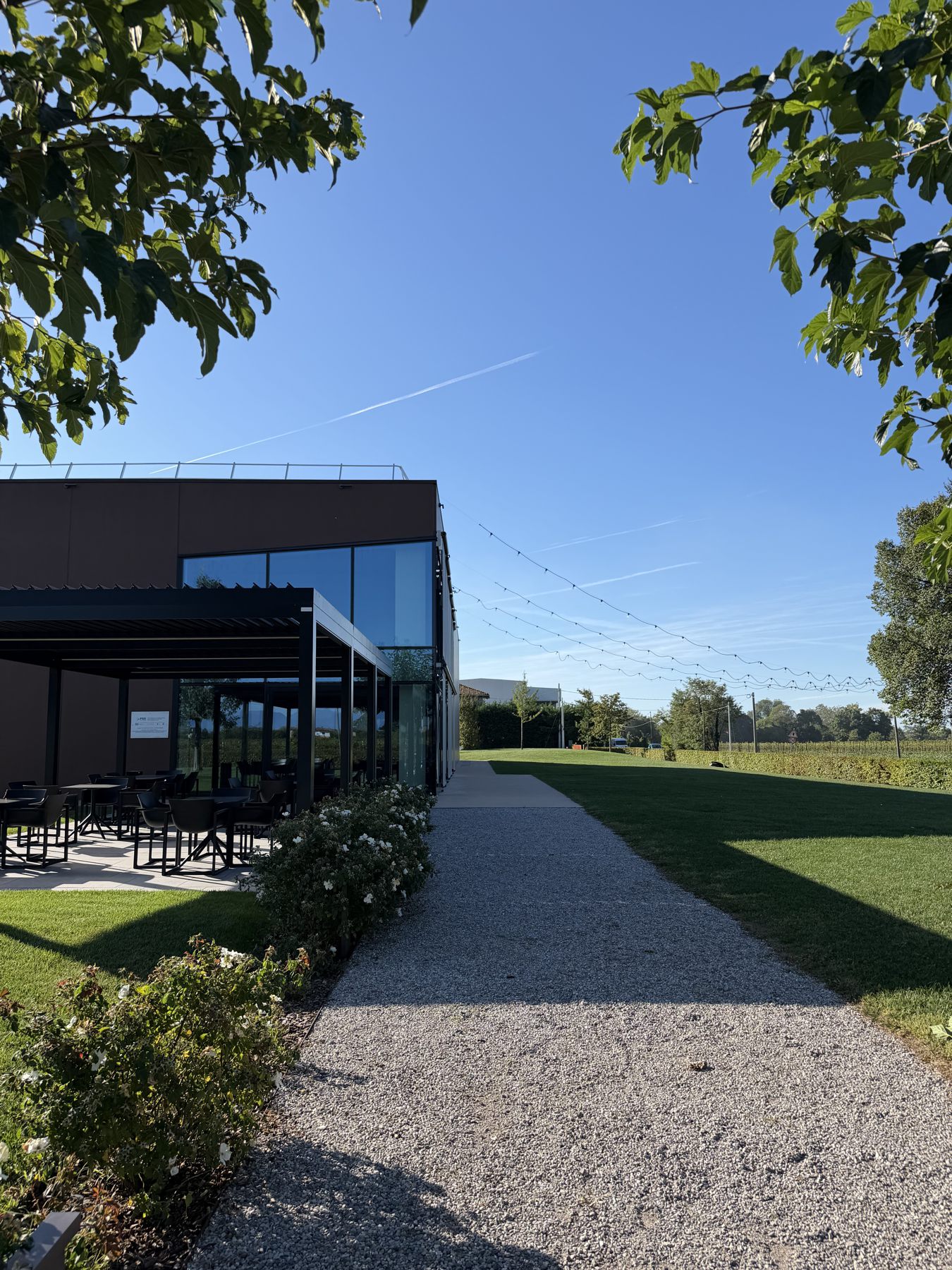 The TreZero winery building and garden path